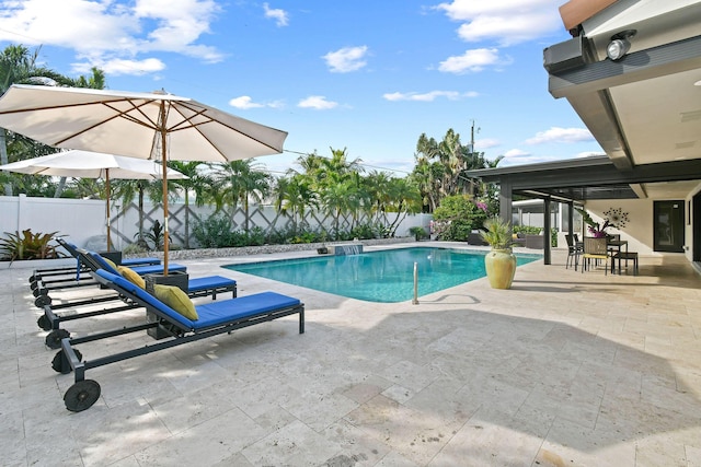 view of swimming pool featuring a patio area