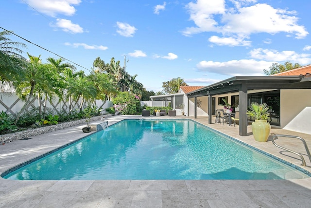 view of swimming pool featuring a patio