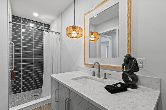 bathroom featuring vanity and walk in shower