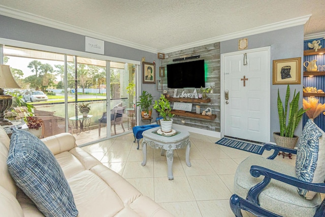 living room with crown molding, light tile patterned floors, and a textured ceiling