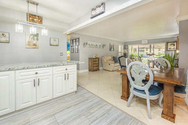 dining area with light tile patterned floors