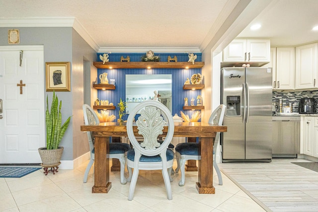 tiled dining room with crown molding