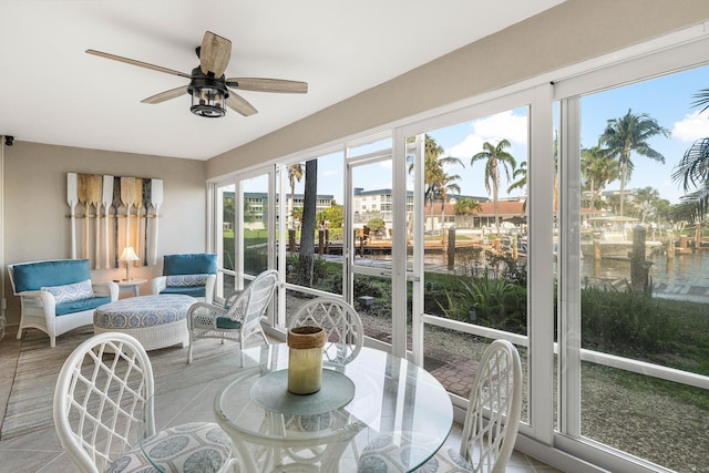 sunroom / solarium with ceiling fan