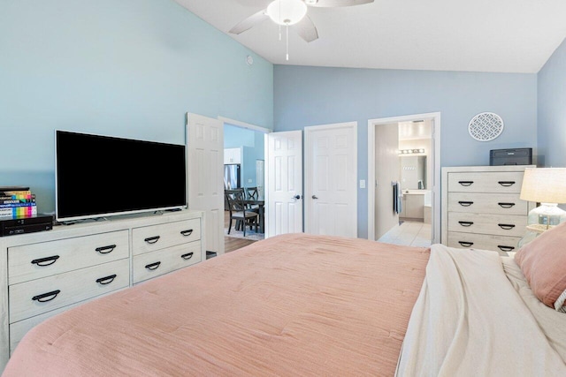 bedroom with high vaulted ceiling, ceiling fan, and connected bathroom