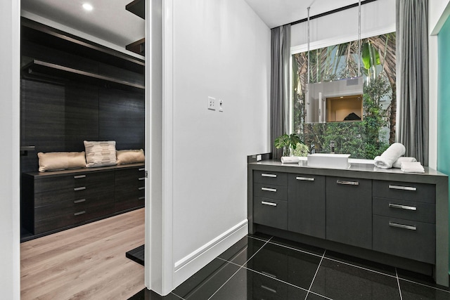 bathroom featuring vanity and tile patterned floors