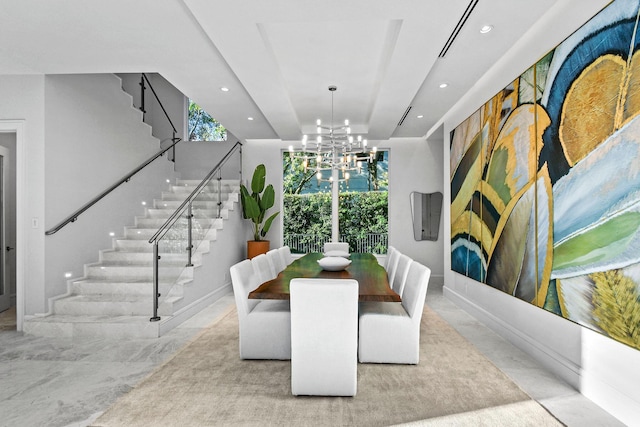 dining area with a notable chandelier