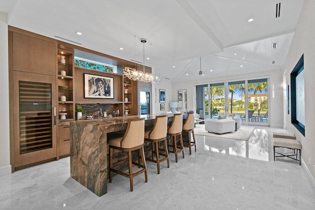 bar featuring dark stone counters, wood ceiling, pendant lighting, built in features, and wine cooler