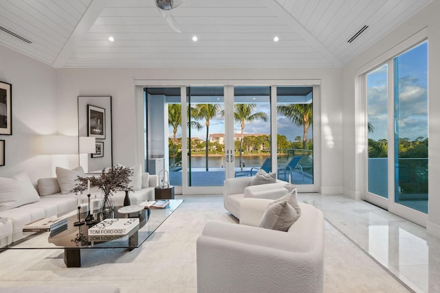 living room featuring french doors, a water view, lofted ceiling, and wood ceiling