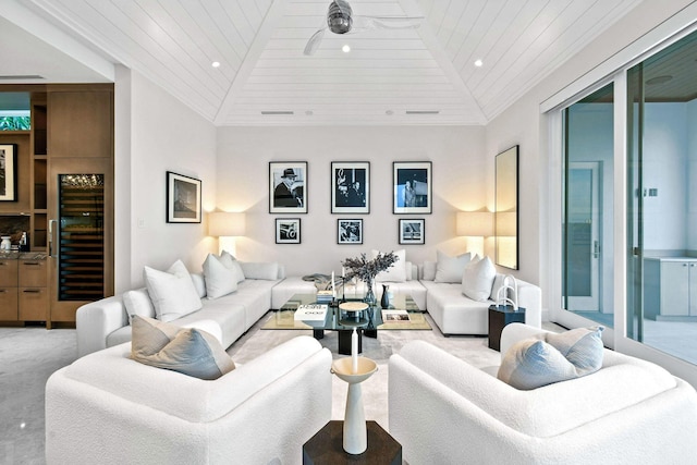 living room featuring ceiling fan, beverage cooler, wooden ceiling, vaulted ceiling, and ornamental molding