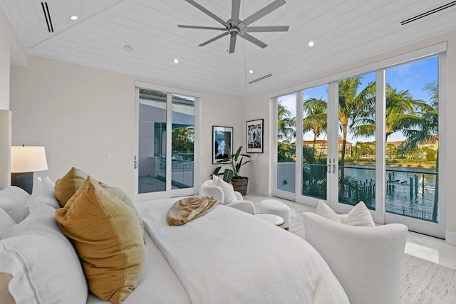 bedroom with wooden ceiling, french doors, ceiling fan, access to exterior, and a towering ceiling