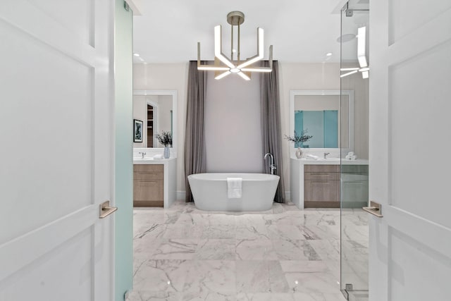 bathroom featuring vanity and shower with separate bathtub