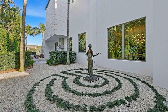 view of side of home featuring a patio area