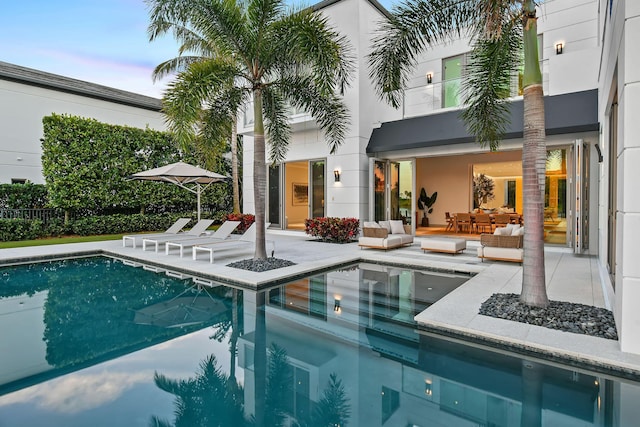 view of swimming pool with an outdoor hangout area