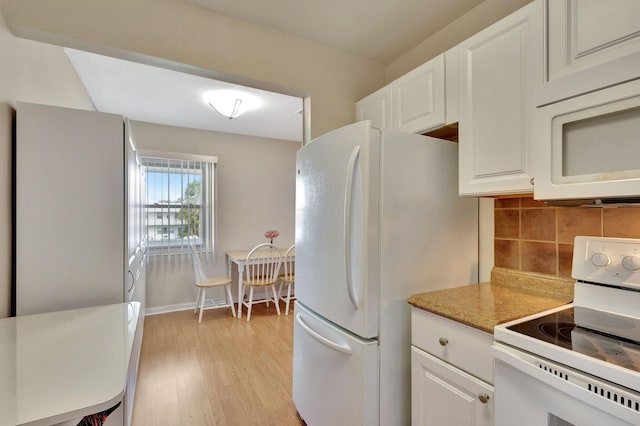 kitchen with decorative backsplash, light wood-type flooring, white appliances, and white cabinetry