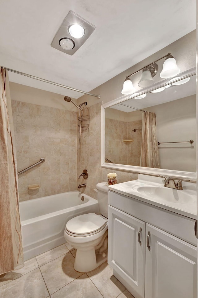 full bathroom featuring tile patterned flooring, shower / bath combination with curtain, vanity, and toilet