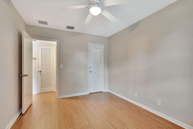 unfurnished bedroom featuring light hardwood / wood-style floors and ceiling fan