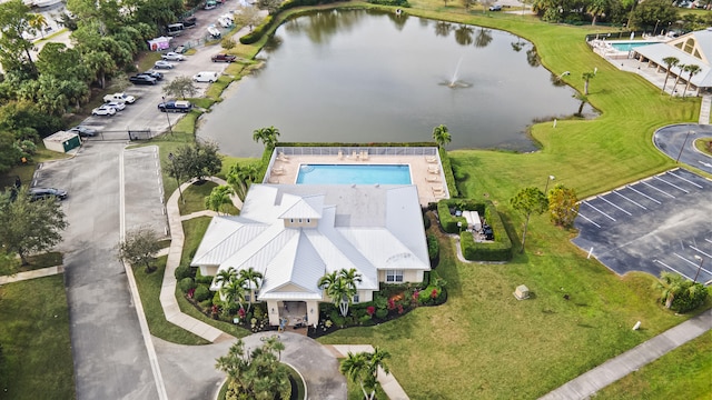 birds eye view of property featuring a water view