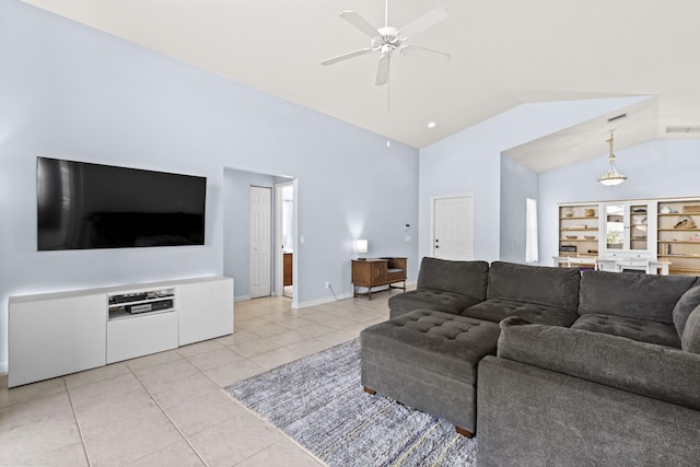 tiled living room featuring ceiling fan, built in features, and lofted ceiling