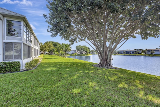 view of yard with a water view