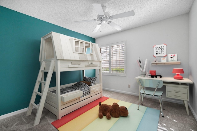 bedroom with light carpet, ceiling fan, and a textured ceiling