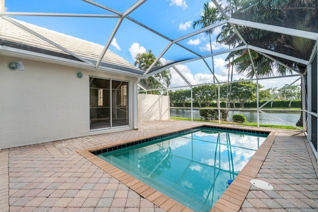 view of pool featuring a water view and a lanai