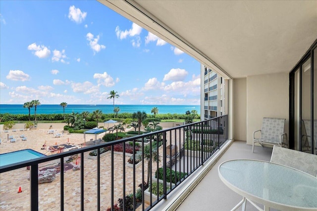 balcony featuring a water view