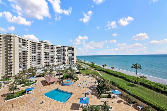 aerial view with a view of the beach and a water view