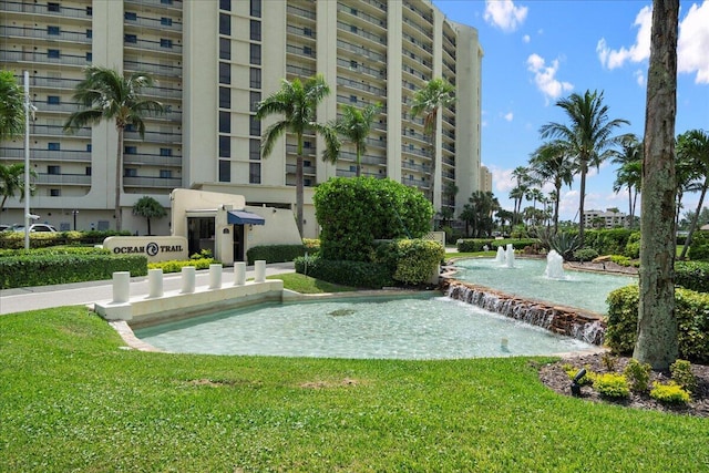 surrounding community with a yard