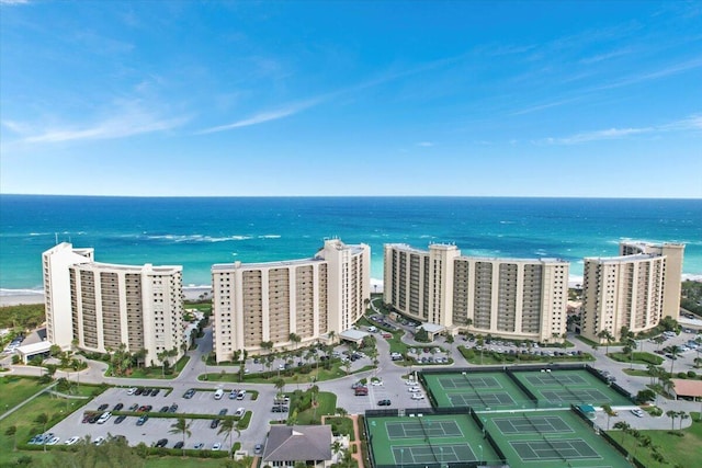 aerial view with a view of the beach and a water view