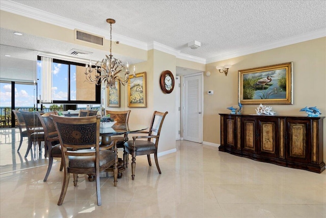 tiled dining space featuring a textured ceiling, an inviting chandelier, and ornamental molding