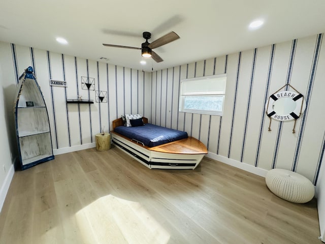 bedroom featuring recessed lighting, a ceiling fan, baseboards, and wood finished floors