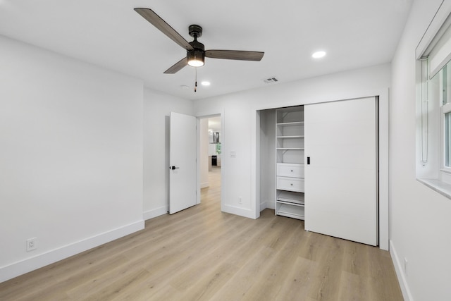 unfurnished bedroom with recessed lighting, light wood-type flooring, baseboards, and visible vents