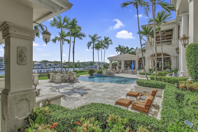 view of pool featuring a patio area