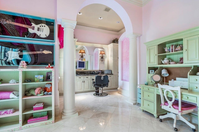 interior space featuring ornate columns and ornamental molding