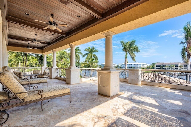 view of patio featuring ceiling fan