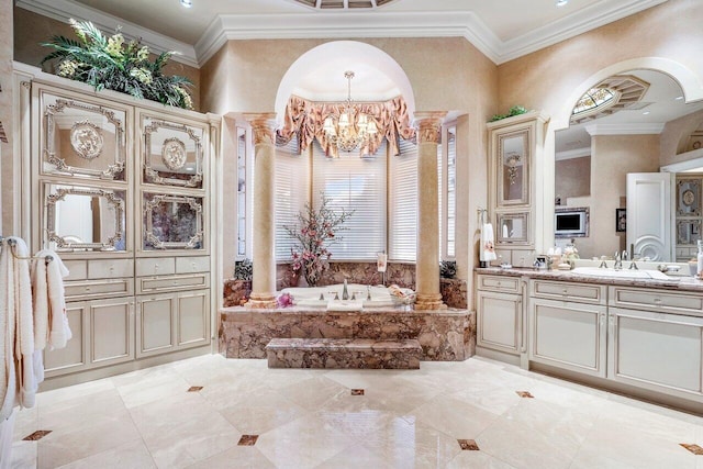 bathroom with ornate columns, ornamental molding, and tiled bath