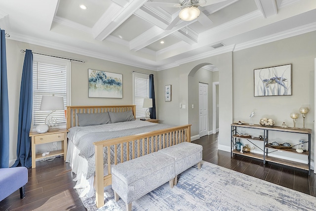 bedroom featuring ceiling fan, beam ceiling, dark hardwood / wood-style floors, and crown molding