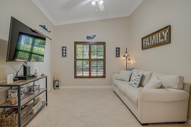 living area with ornamental molding, a ceiling fan, baseboards, and light tile patterned floors