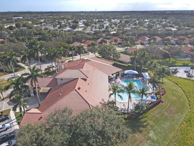 bird's eye view featuring a residential view and a water view