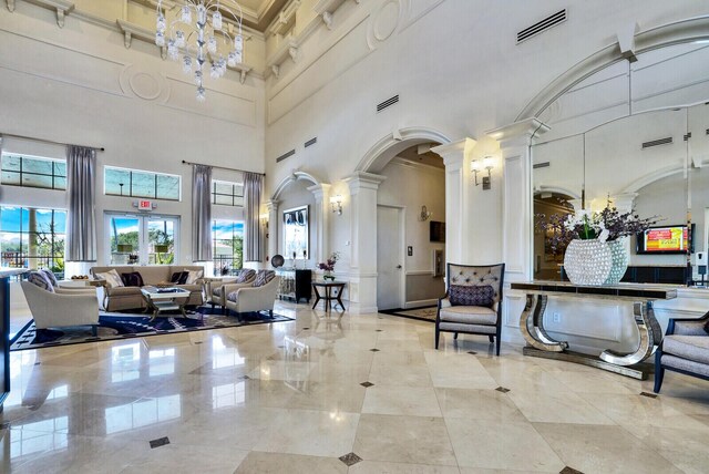 view of patio / terrace with ceiling fan and a community pool