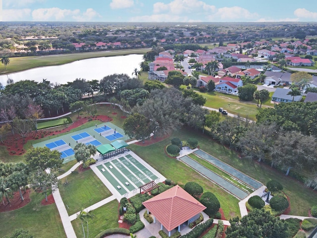 birds eye view of property featuring a residential view and a water view