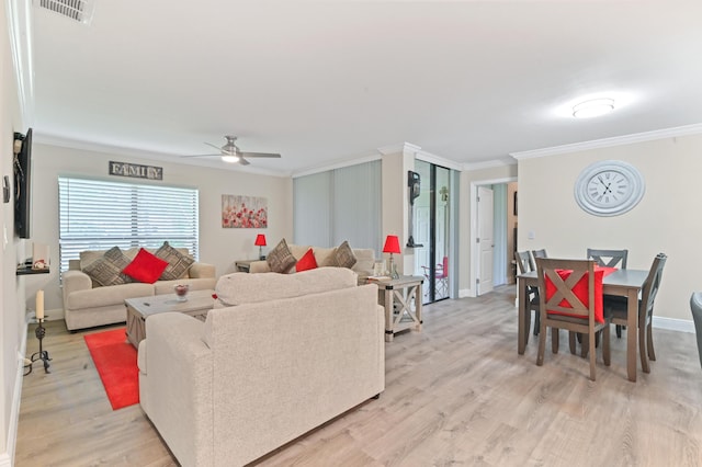 living room featuring ceiling fan, light hardwood / wood-style floors, and ornamental molding