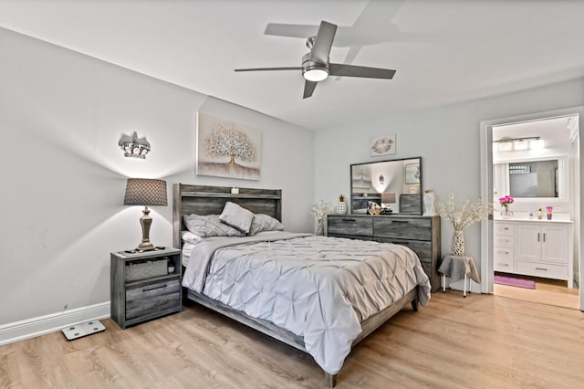 bedroom with connected bathroom, ceiling fan, and light hardwood / wood-style floors