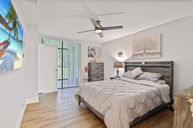 bedroom featuring ceiling fan and light wood-type flooring