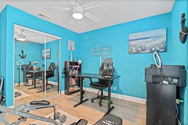 office featuring hardwood / wood-style flooring and ceiling fan