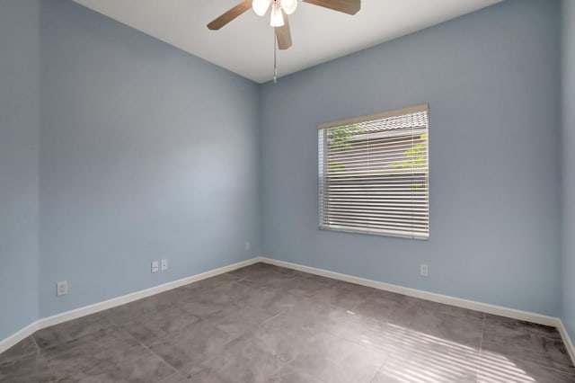 spare room featuring ceiling fan