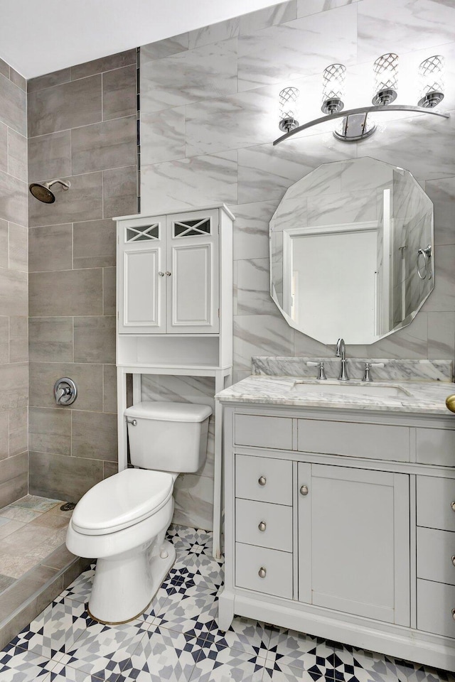 8620 Pine Cay, West Palm Beach, FL 33411 - full bathroom featuring a tile shower, toilet, and vanity