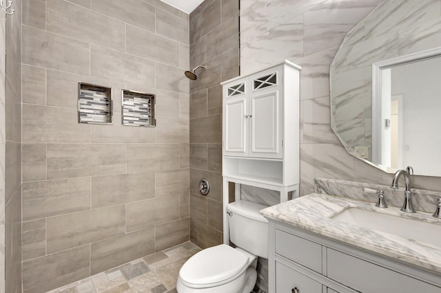 8620 Pine Cay, West Palm Beach, FL 33411 - full bath with a tile shower, vanity, and toilet