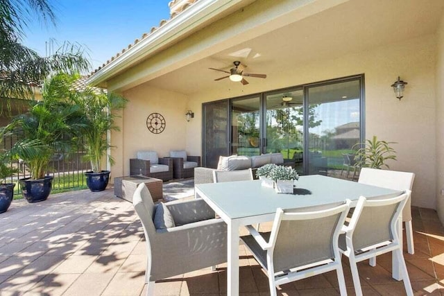 view of patio / terrace featuring ceiling fan