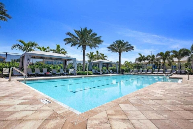 view of swimming pool featuring a gazebo